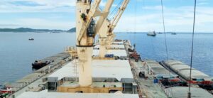 View along a bulk carrier deck at anchor