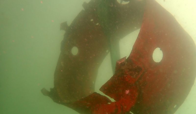 Damaged rudder underwater before repair
