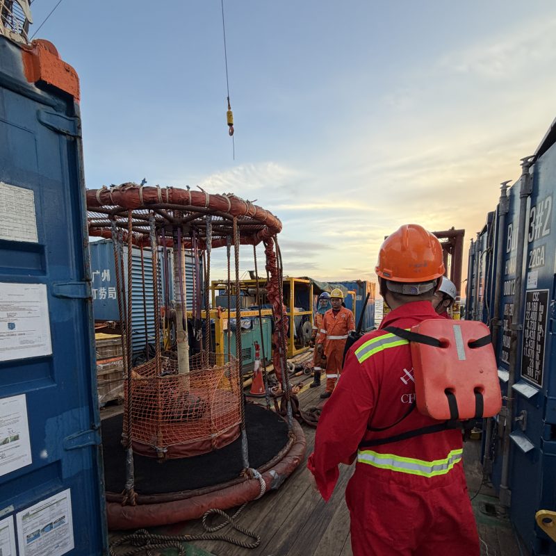 Thai Subsea team member at the dive basket on deck