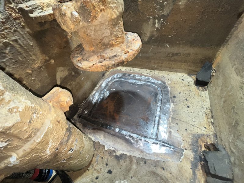 Welded insert plate repair on a ship hull